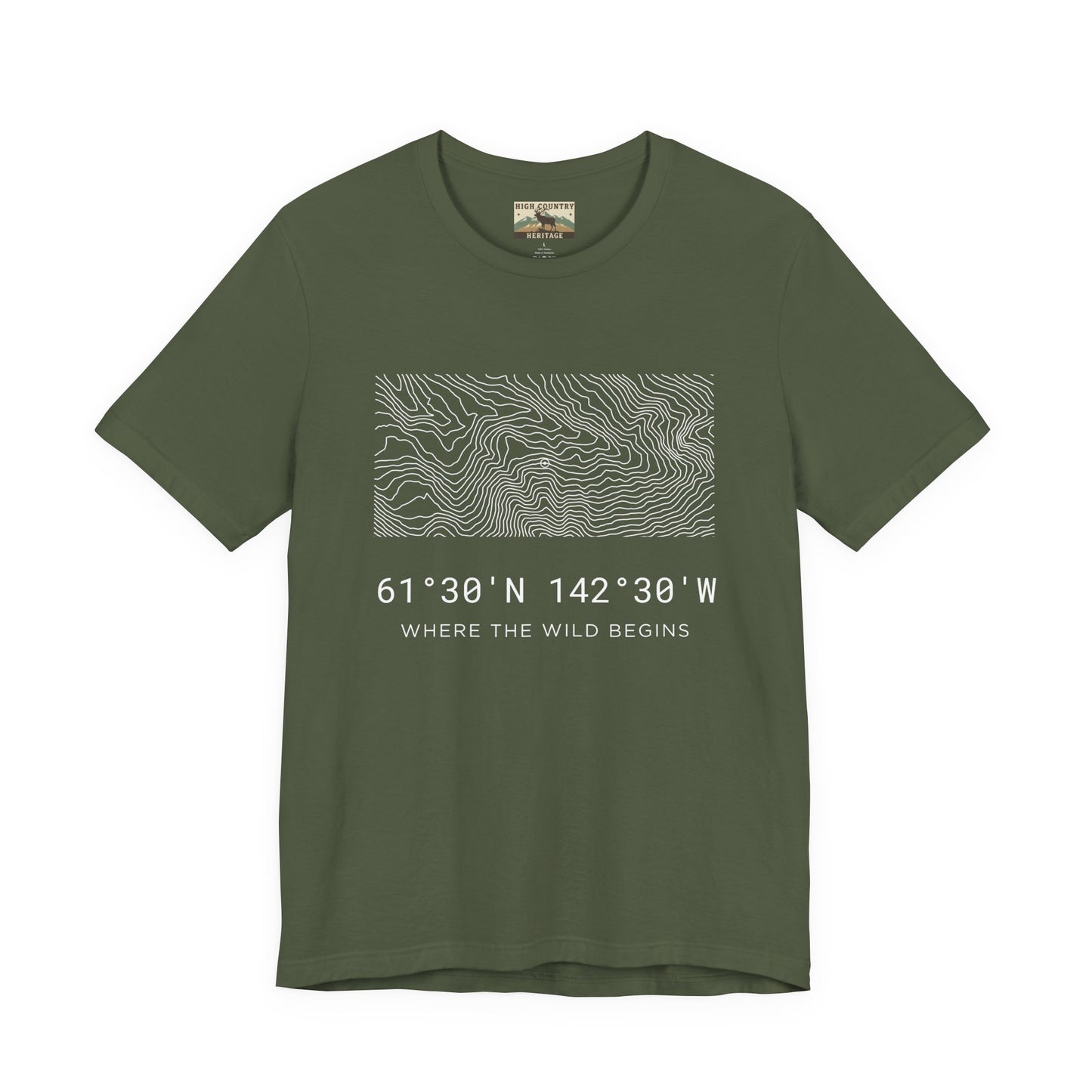 High Country Heritage Alaska hunting coordinates tee in Military Green, featuring the Wrangell-St. Elias topographic contour map and GPS coordinates printed in white on a flat product mockup.