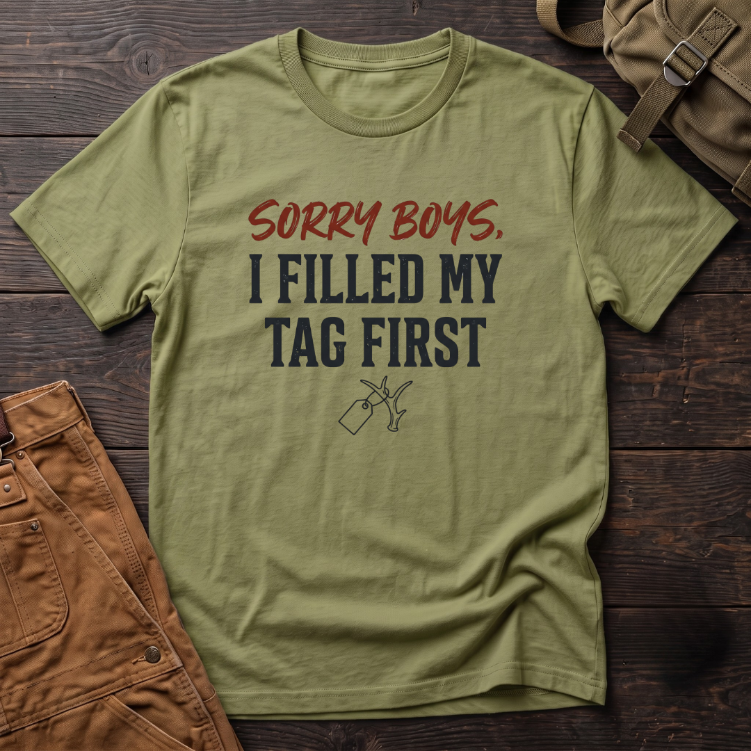 Heather Green funny hunting t-shirt with Sorry Boys, I Filled My Tag First text and a hunting tag hanging on an antler