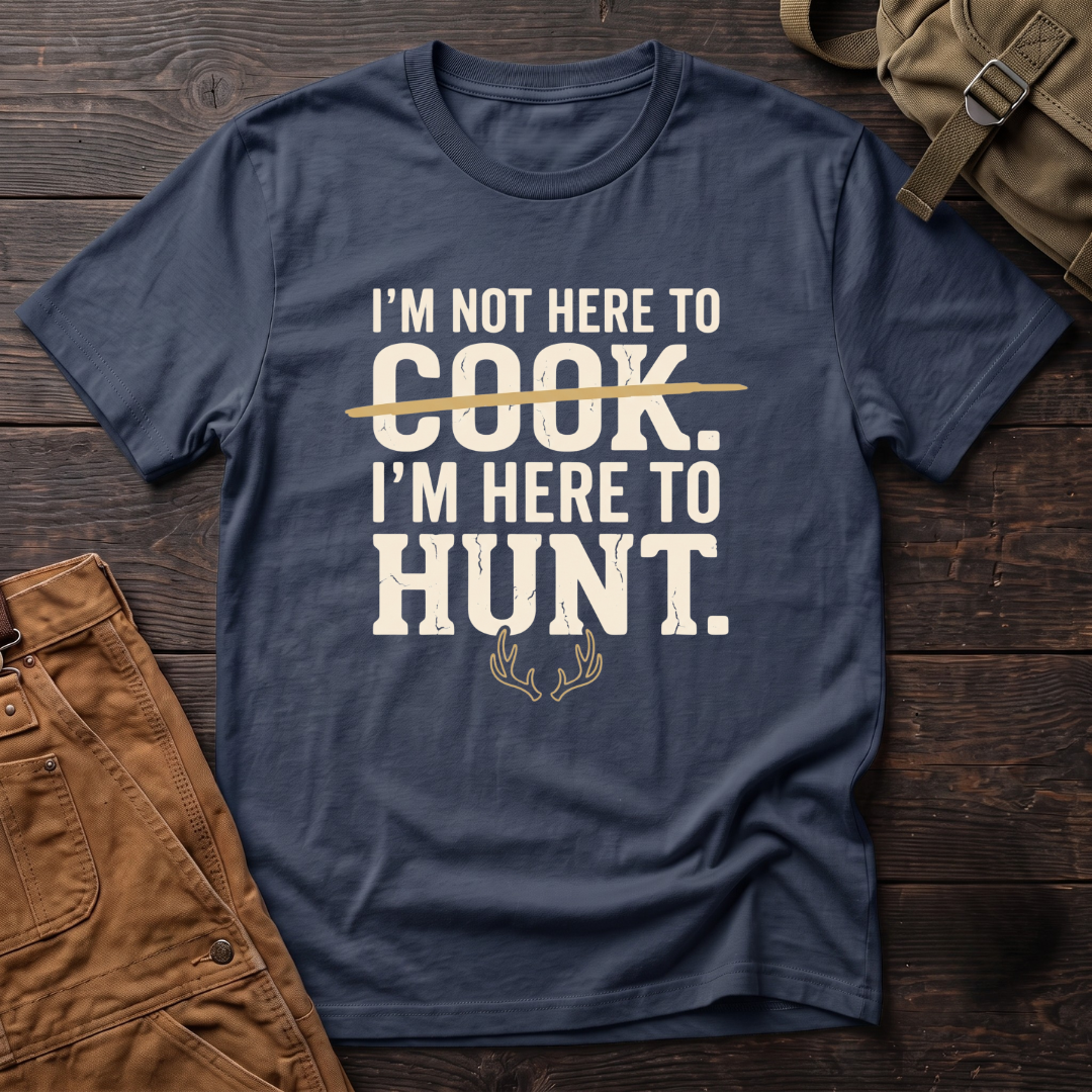 Navy funny hunting t-shirt with I'm Not Here To Cook, I'm Here To Hunt text, the word Cook crossed out, and a pair of antlers
