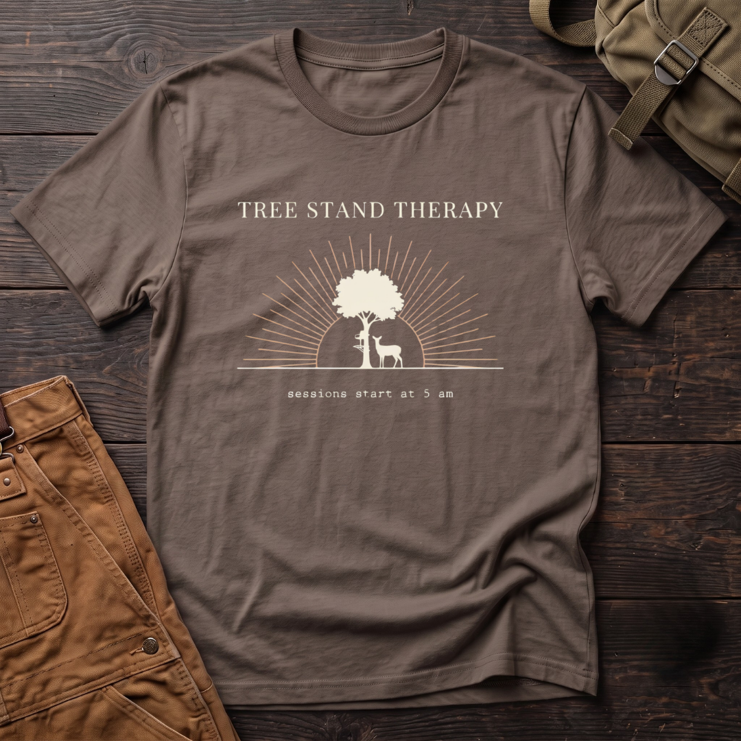 Brown funny deer hunting t-shirt with Tree Stand Therapy, sessions start at 5 am text, a tree with a tree stand and a deer in front of a rising sun
