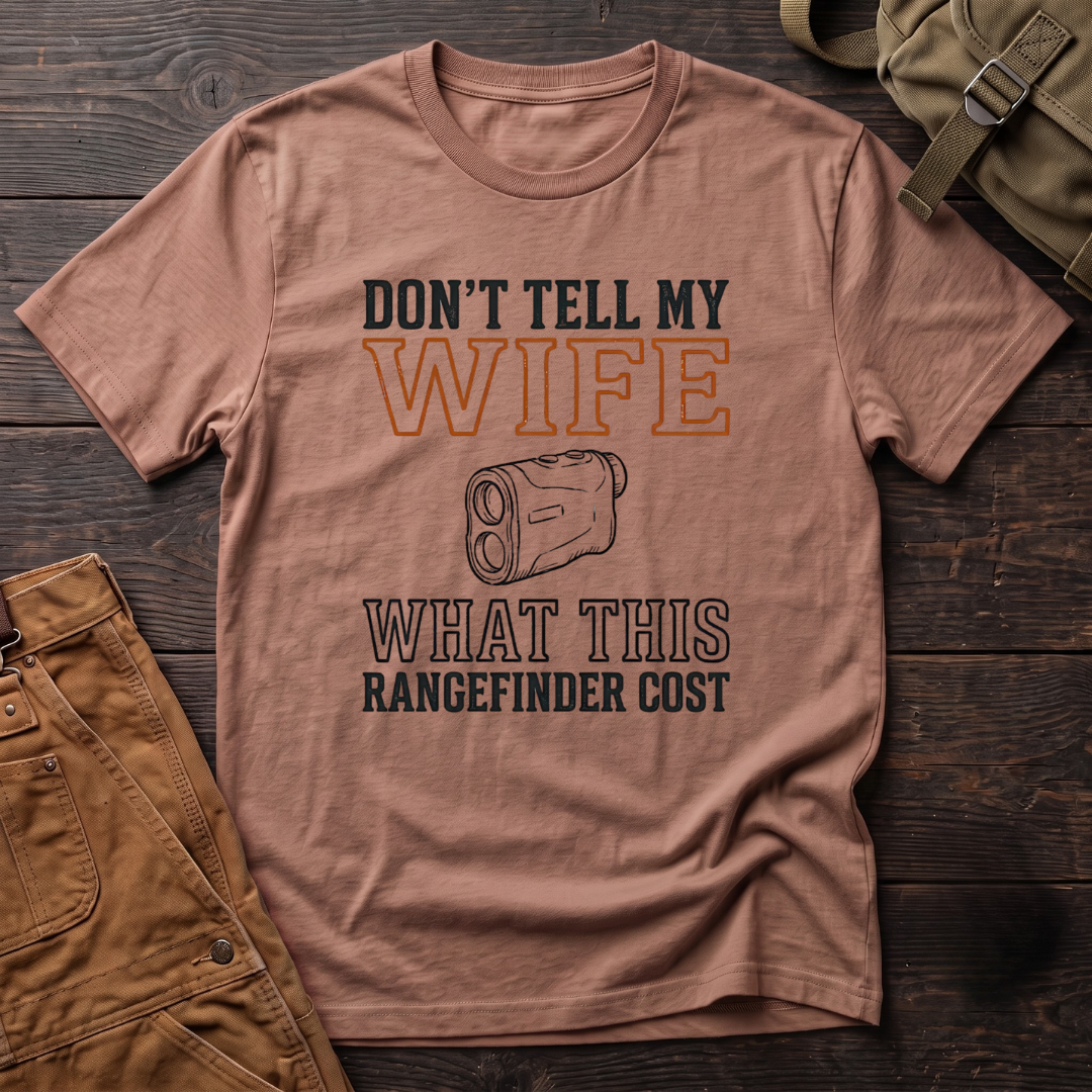 Heather Clay funny hunting t-shirt with Don't Tell My Wife What This Rangefinder Cost text and a line drawing of a rangefinder