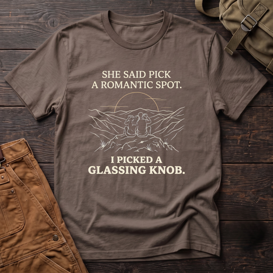 Brown funny hunting t-shirt with She Said Pick A Romantic Spot, I Picked A Glassing Knob text and a line-art couple glassing from a ridge at sunset