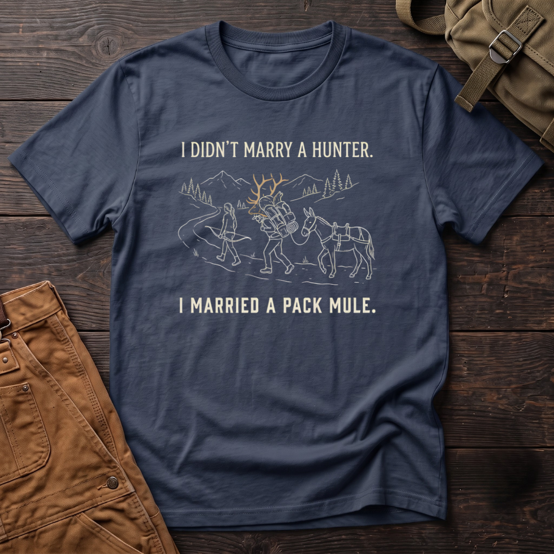 Navy funny hunting t-shirt with I Didn't Marry A Hunter, I Married A Pack Mule text and a line-art bowhunter walking ahead of a partner who packs out an elk rack, next to a pack mule