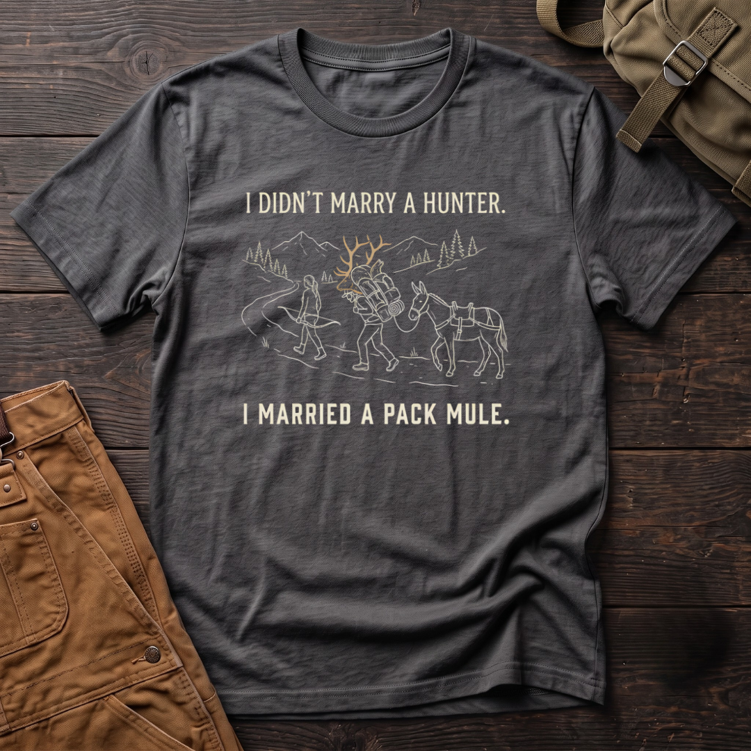 Asphalt funny hunting t-shirt with I Didn't Marry A Hunter, I Married A Pack Mule text and a line-art bowhunter walking ahead of a partner who packs out an elk rack, next to a pack mule