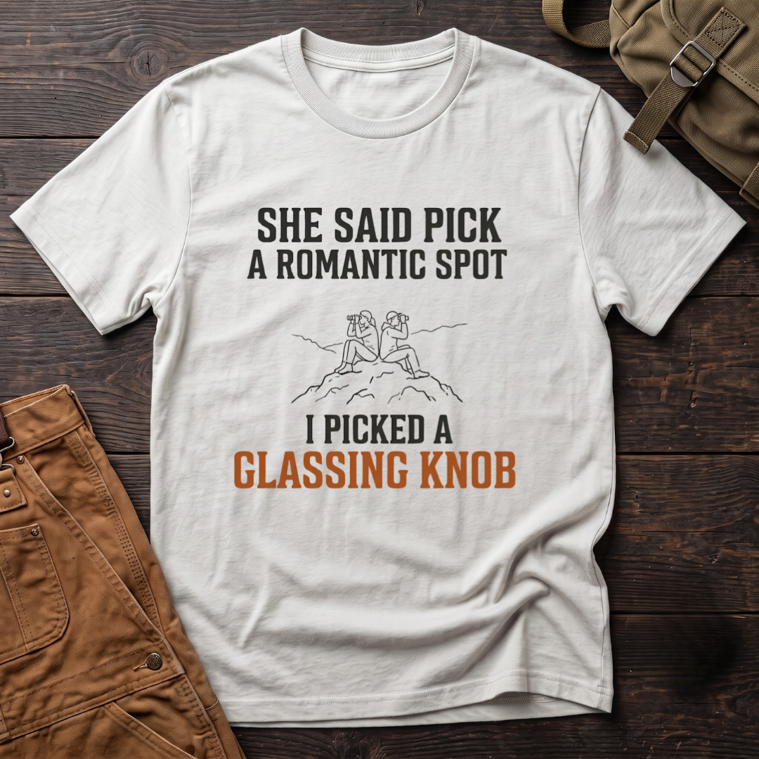 White funny hunting t-shirt with She Said Pick A Romantic Spot, I Picked A Glassing Knob text and a line-art couple glassing from a rocky knob