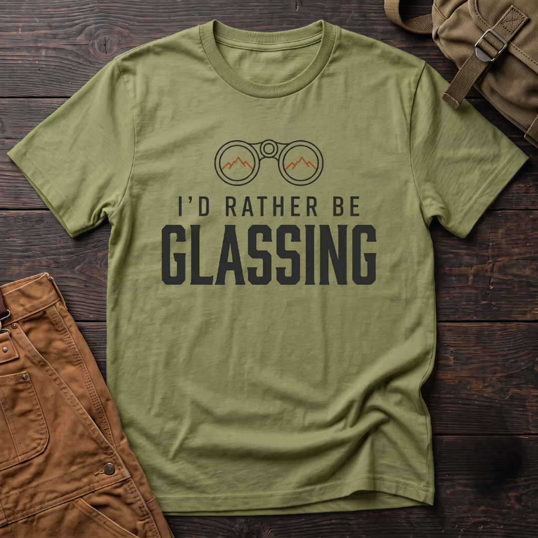 Heather Green hunting t-shirt with I'd Rather Be Glassing text and binoculars with mountains in the lenses