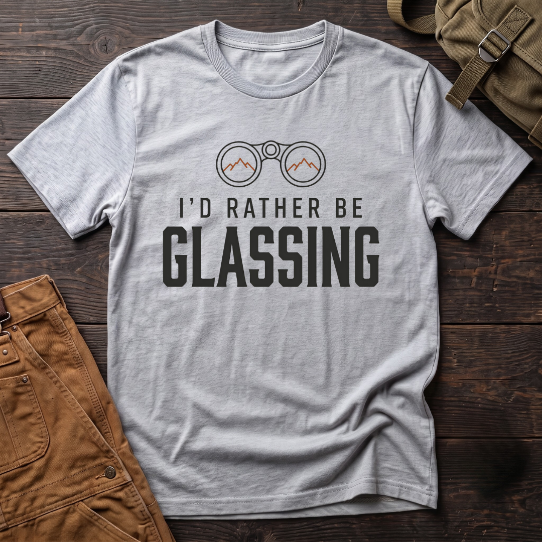 Athletic Heather hunting t-shirt with I'd Rather Be Glassing text and binoculars with mountains in the lenses
