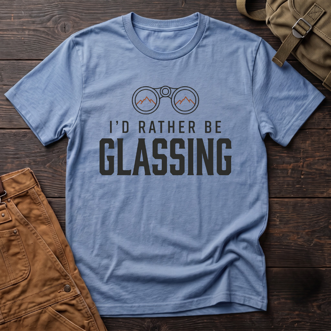 Heather Columbia Blue hunting t-shirt with I'd Rather Be Glassing text and binoculars with mountains in the lenses