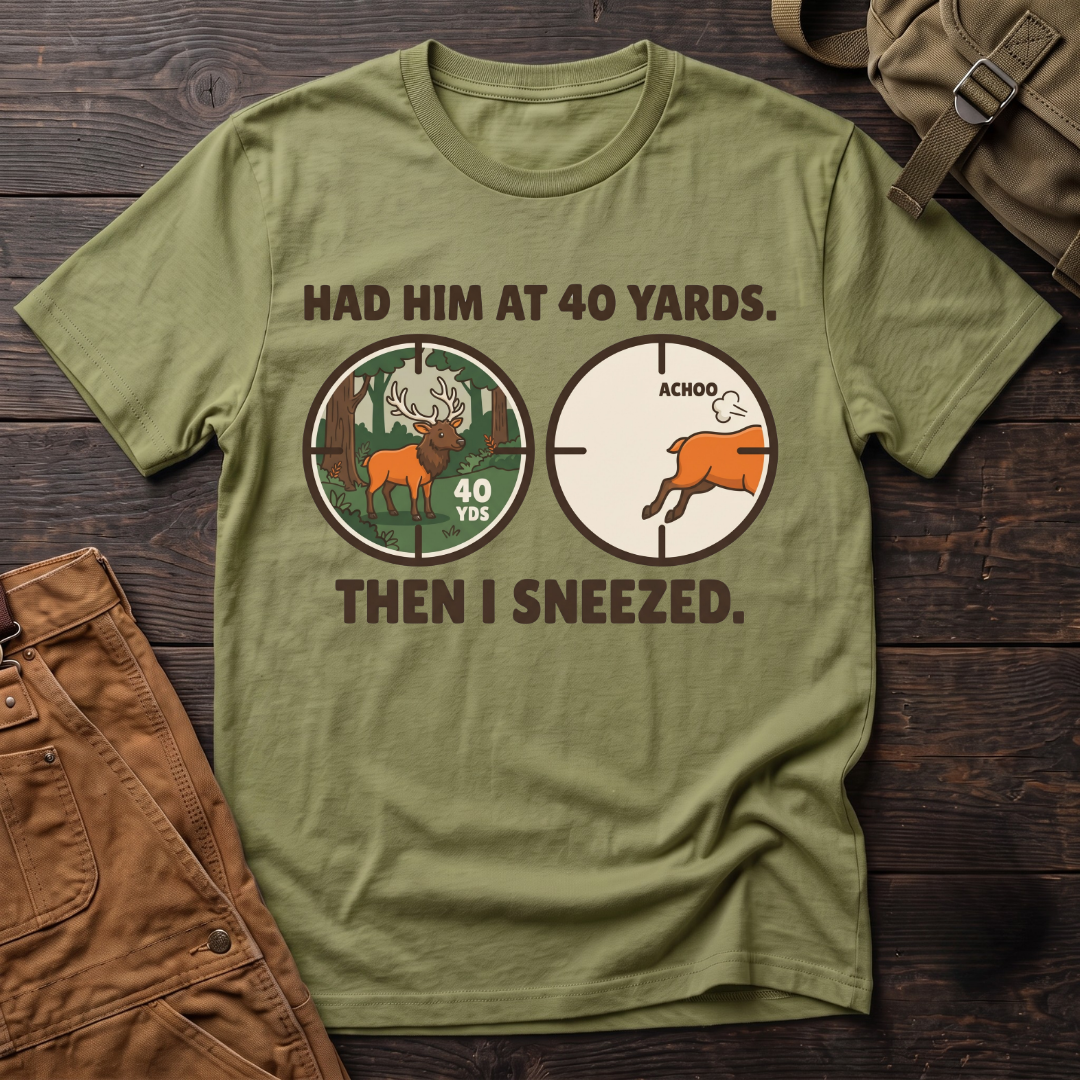 Heather Green funny elk hunting t-shirt with Had Him At 40 Yards. Then I Sneezed. and two scope views, an elk at 40 yards and the elk running after Achoo