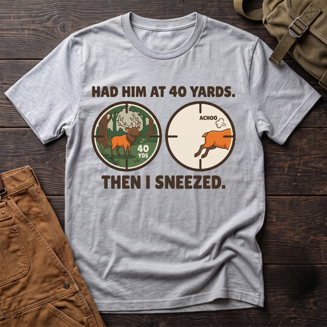 Athletic Heather funny elk hunting t-shirt with Had Him At 40 Yards. Then I Sneezed. and two scope views, an elk at 40 yards and the elk running after Achoo