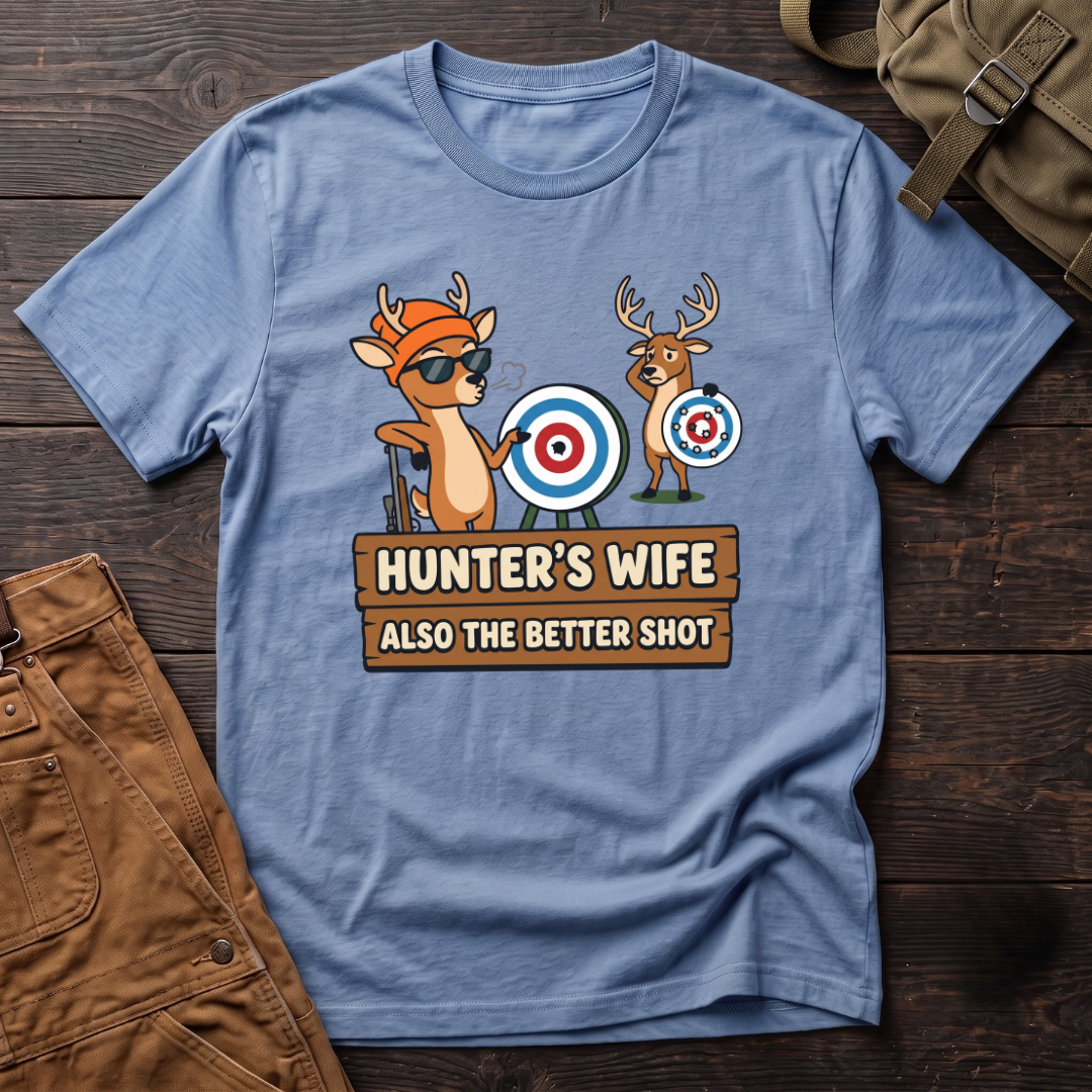Heather Columbia Blue funny hunter's wife t-shirt with Hunter's Wife Also The Better Shot sign and two cartoon deer with archery targets, one hit dead center