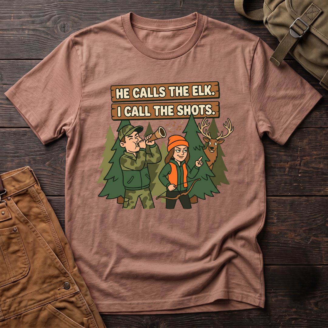 Heather Clay funny hunting couple t-shirt with He Calls The Elk. I Call The Shots. signs, a husband with an elk call, his wife with a bow and a bull elk