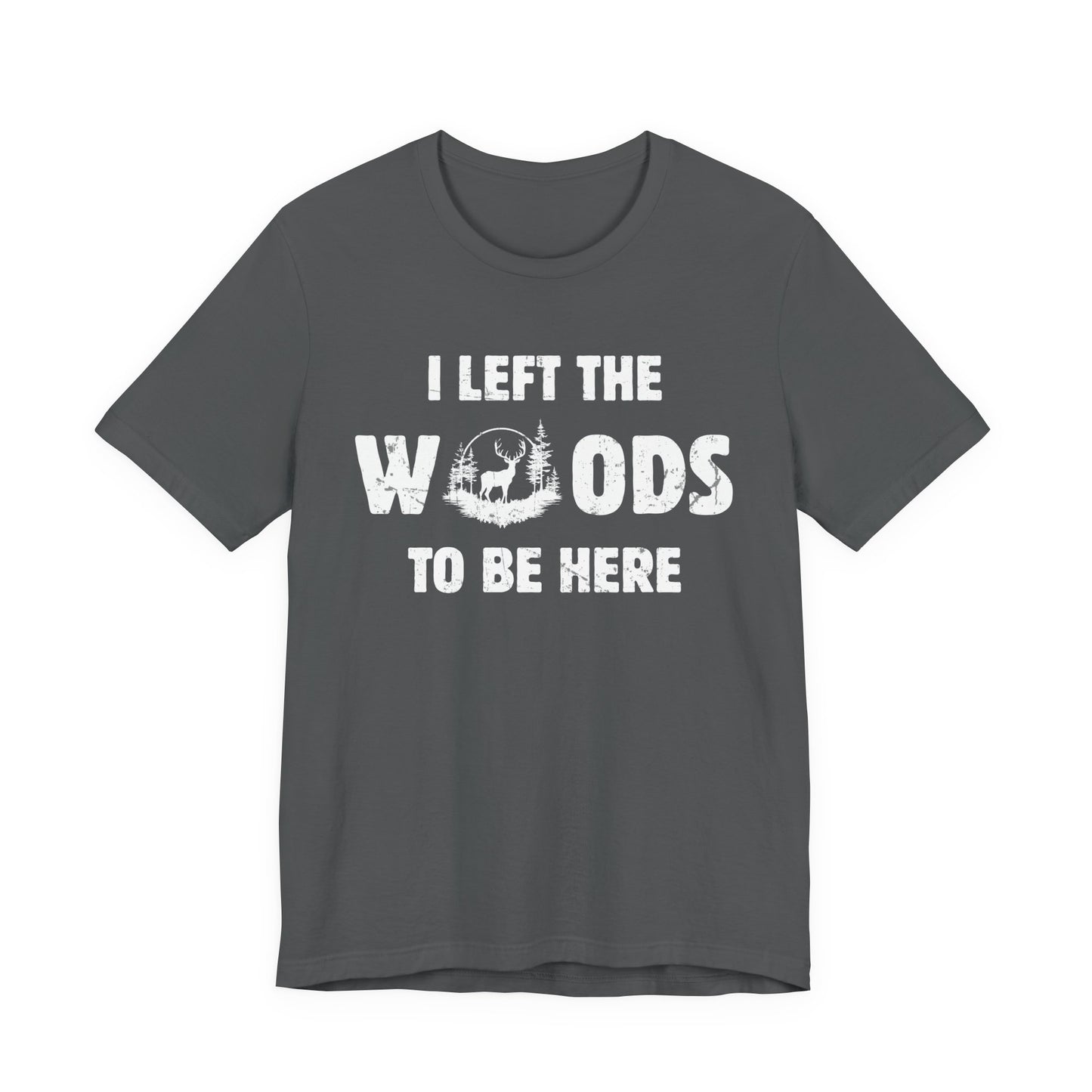 I Left the Woods to Be Here deer hunting graphic tee in asphalt on a white background showing the full distressed woodland slogan print.