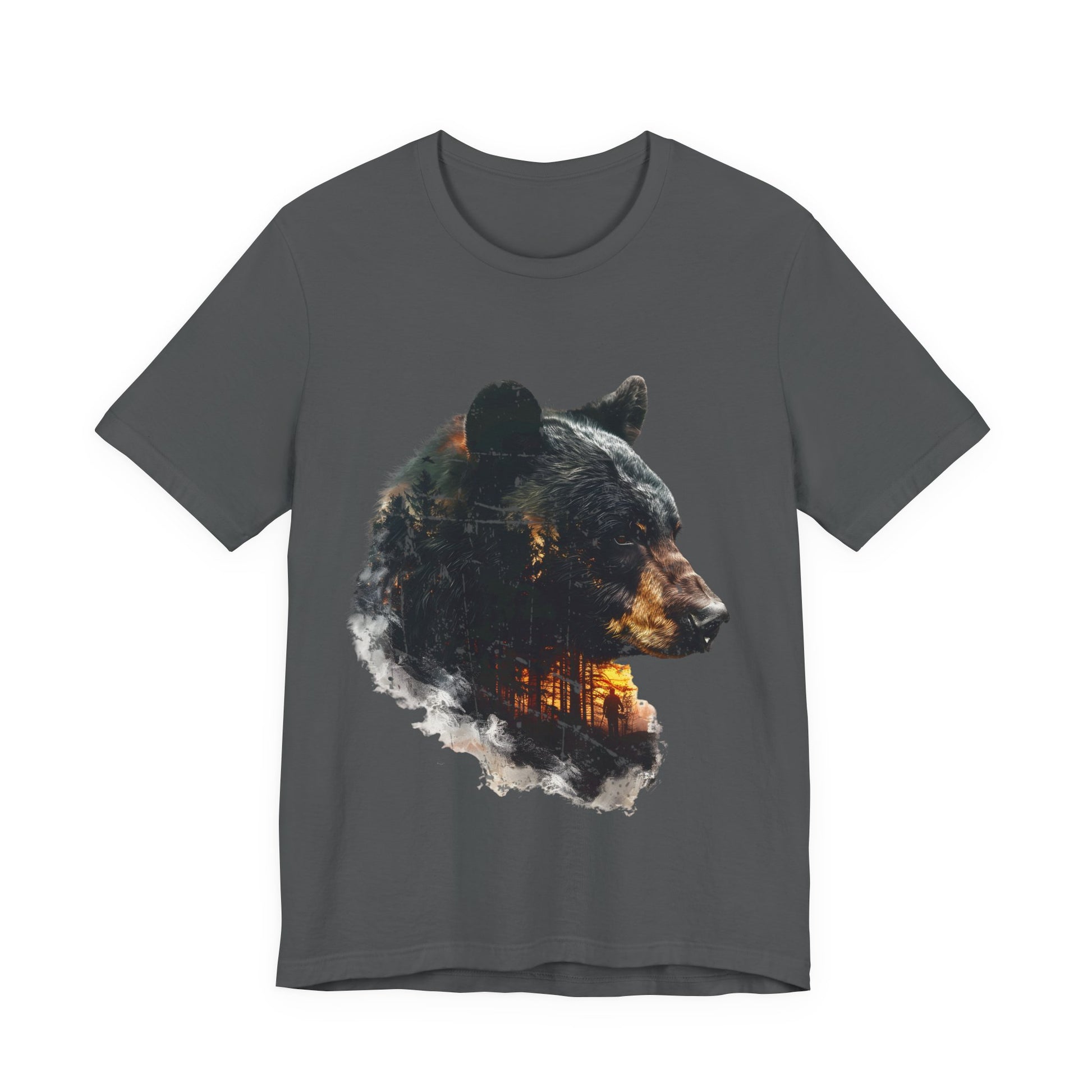 Black bear double exposure wilderness graphic t-shirt in asphalt on a white background showing the full bear silhouette with pine forest, fiery amber light, and lone hunter figure inside.